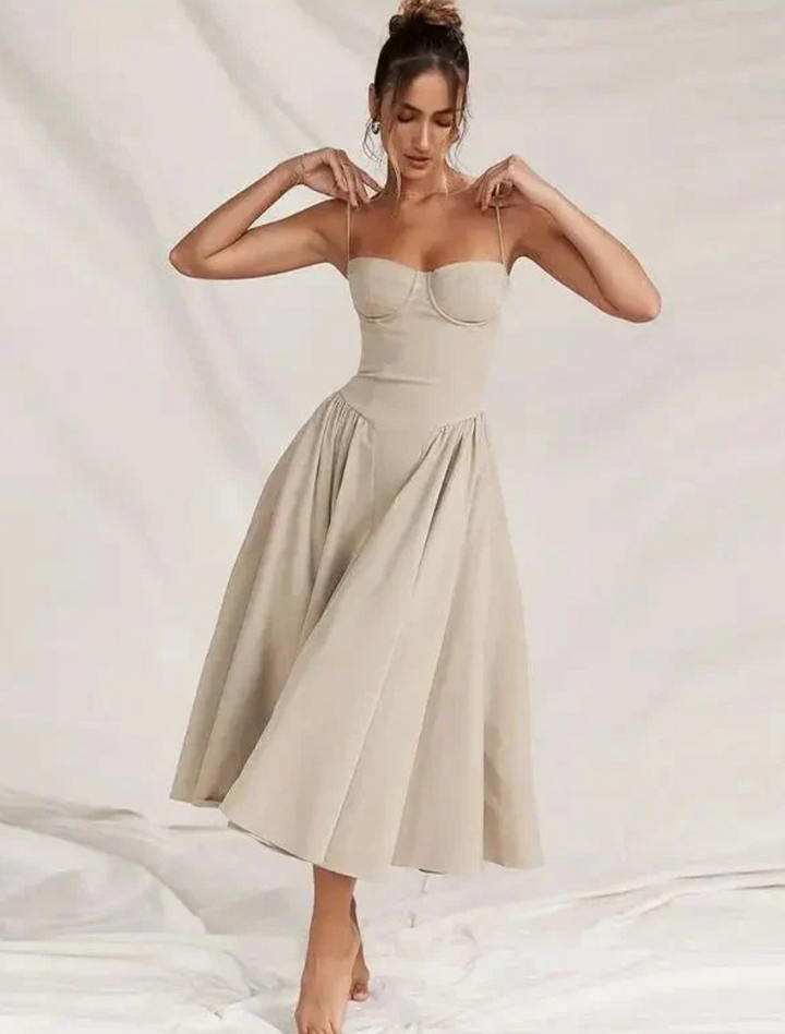 Stylish women's V-neck midi dress, perfect for casual summer days & vacation. Flowy, comfortable ladies fashion.
