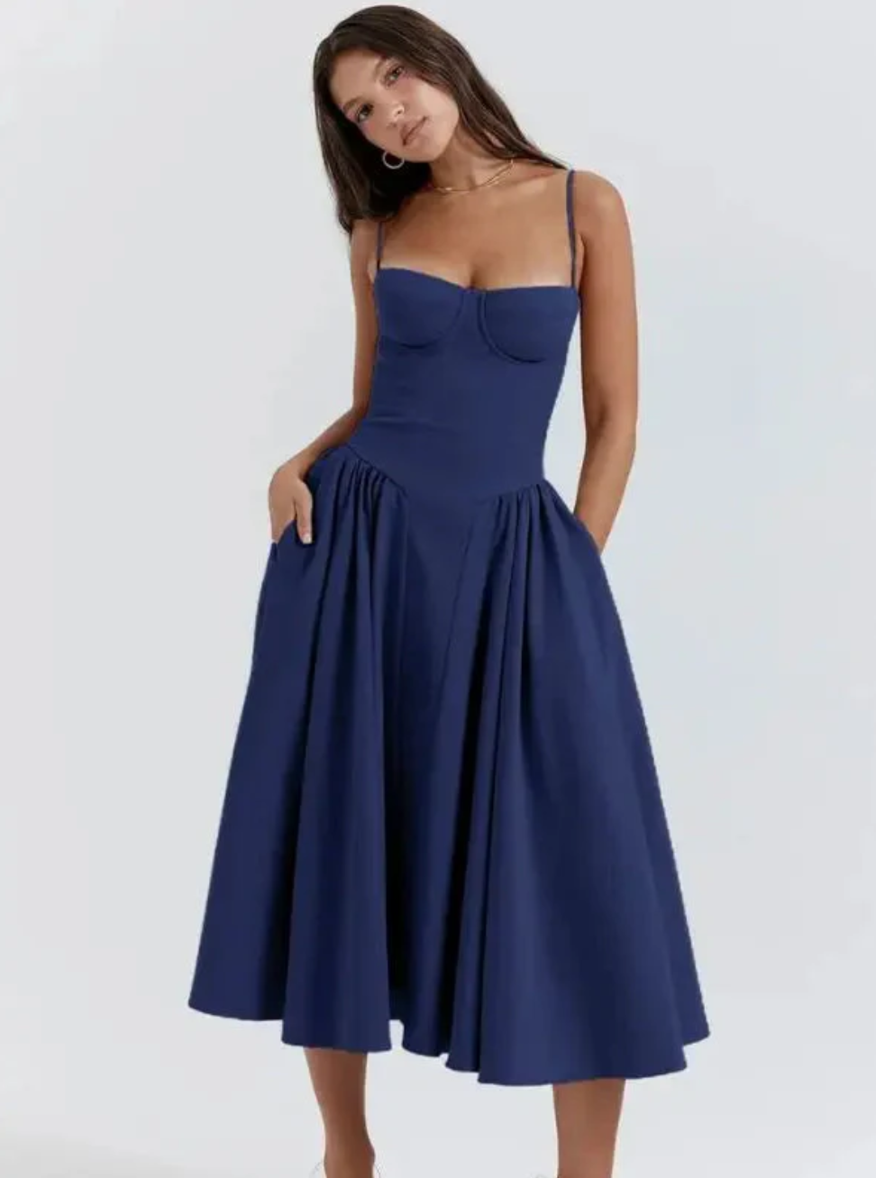 Flowy sleeveless V-neck midi dress for women, ideal as a casual summer beach or vacation dress.