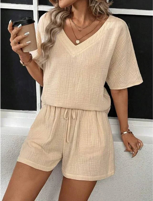 Women's casual chic V-neck top and shorts set, ideal for comfortable spring & summer styling.