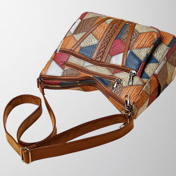 Modern women's stylish vegetable leather handbag. Ideal for everyday use, worn as shoulder or crossbody.