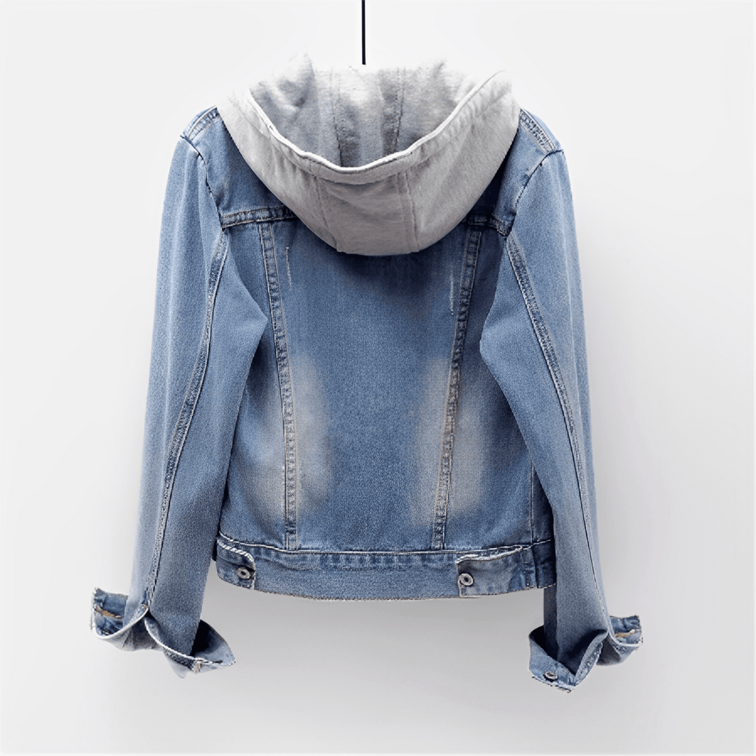 Casual women's hooded denim jacket with a vintage wash, perfect for spring outfits.