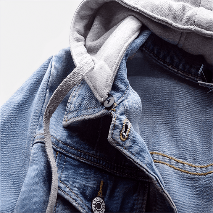 Fashionable women's outerwear: a light blue denim jacket with a vintage look and a removable hood.