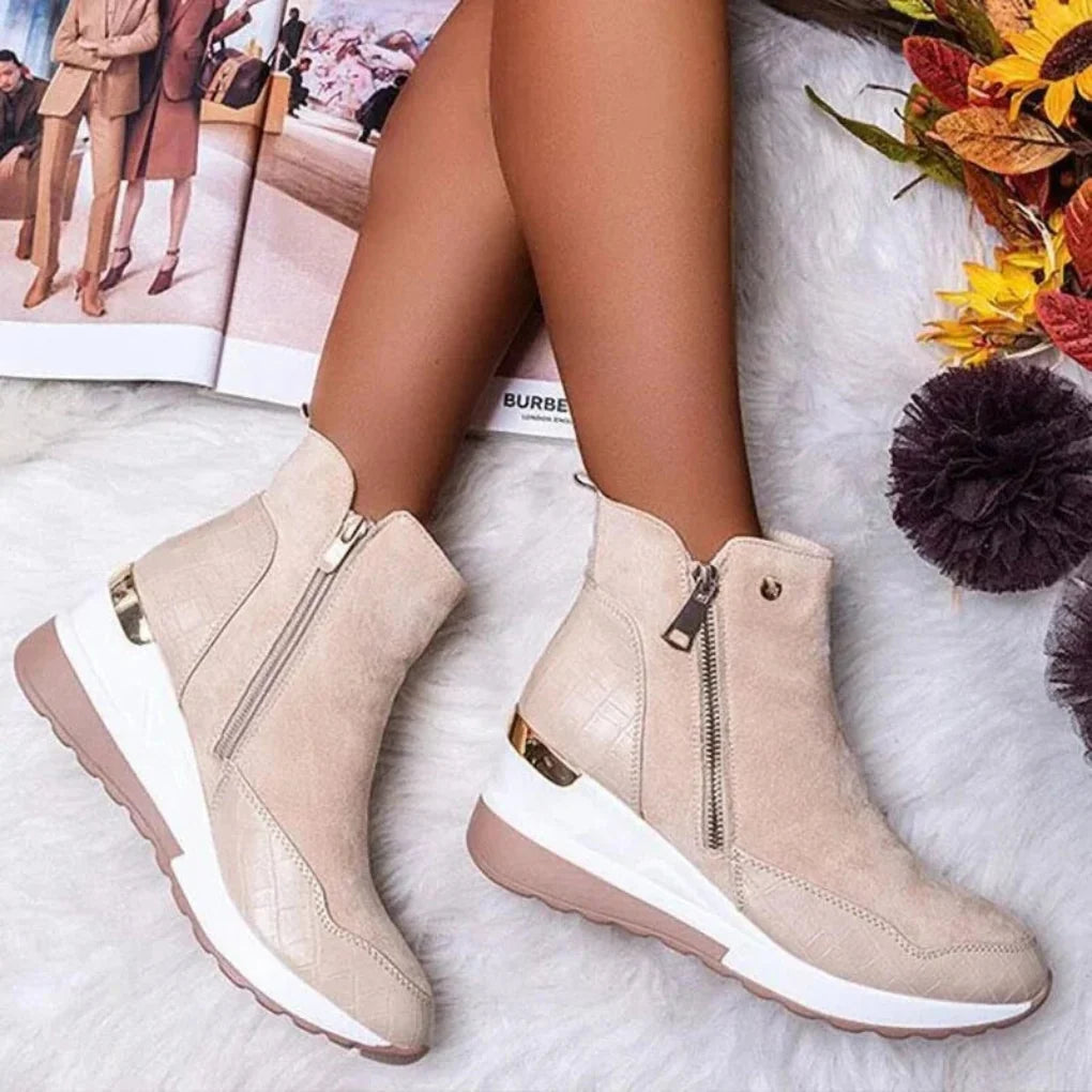 Women's waterproof ankle boots with durable traction sole, ideal for winter, fall, and rainy conditions.