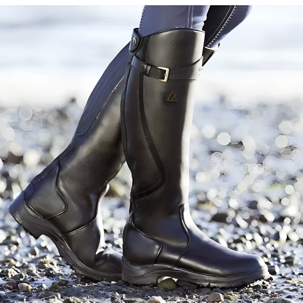 Close-up of women's waterproof ankle boots, highlighting the sturdy material & side zipper detail.