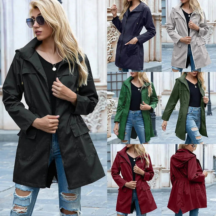 Practical and stylish women's long raincoat, perfect for autumn and winter. Waterproof, windproof, lightweight outerwear.