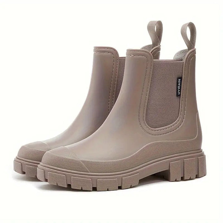 Trendy women's ankle rain boots, perfect for fashion-forward wet weather protection. Waterproof & chic.