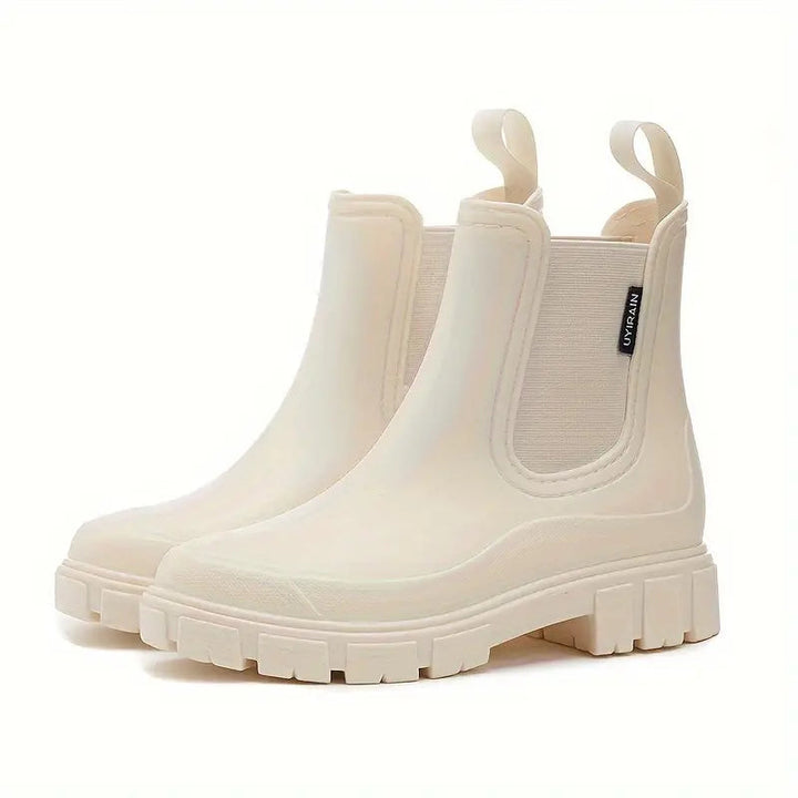 Chic women's waterproof puddle boots for outdoor adventures. Stylish, non-slip, and perfect for wet weather.