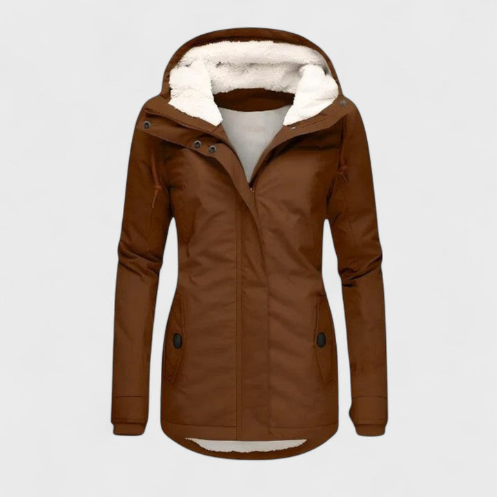 Long women's waterproof winter jacket with an adjustable hood, offering warmth & style for cold and wet conditions.