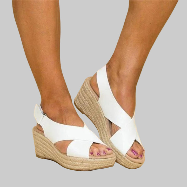 Fashionable women's wedge espadrilles, ideal for warm weather. Comfortable, stylish summer sandals with a casual look.