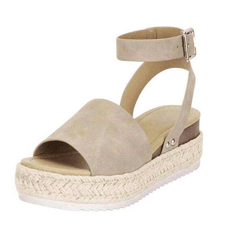 Trendy women's wedge sandals with chic ankle strap, offering stylish comfort for summer and holiday wear.