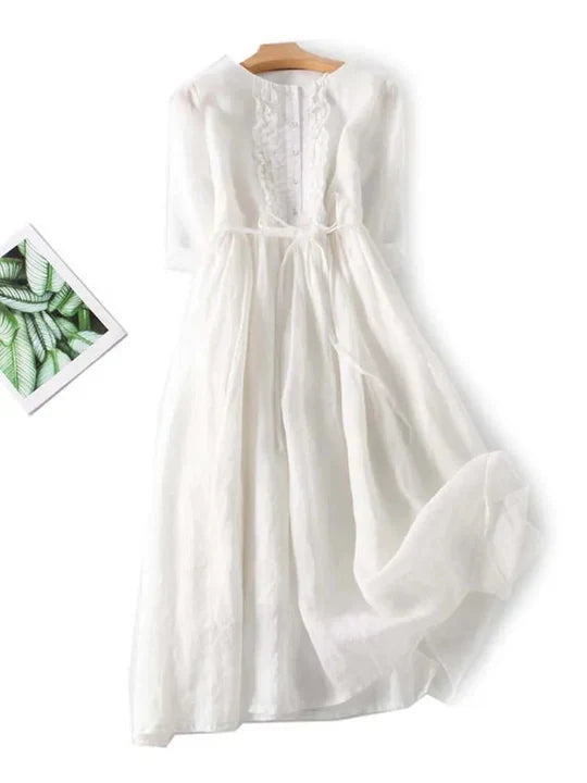 Lightweight & breathable women's O-neck ruffle summer dress, ideal for holidays, beach days, and casual elegance.