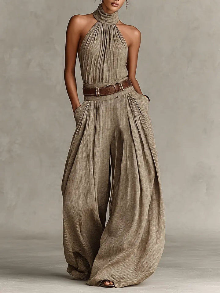 Taupe women's halter neck wide-leg jumpsuit, perfect for bohemian resort wear or casual chic vacation outfits.
