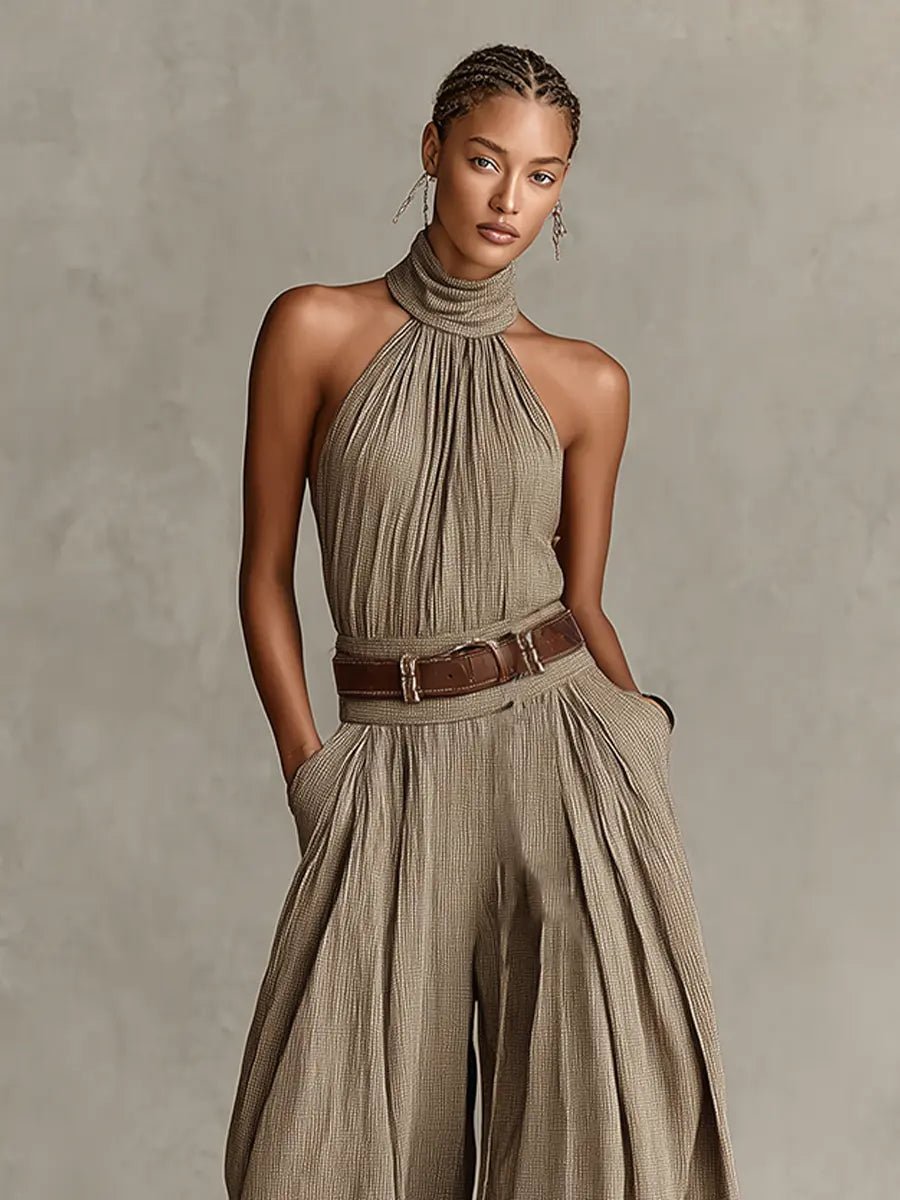 Sleeveless taupe wide-leg halter jumpsuit, an effortless bohemian style for women's resort and vacation outfits.