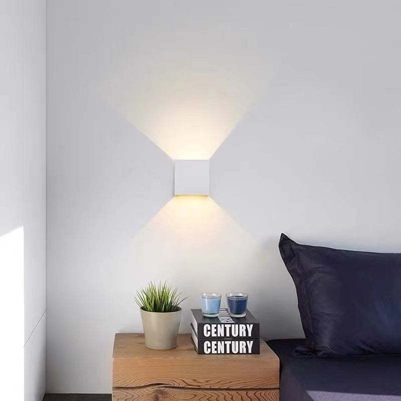 Architectural Tavey LED wall light, square, offering up/down adjustable illumination.