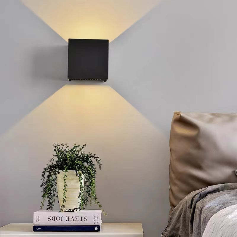 Versatile Tavey LED outdoor wall lamp, perfect for entryways, patios, or indoors.