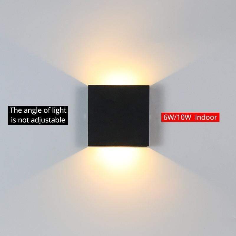 Tavey square LED wall light, black, providing accent lighting for contemporary spaces.
