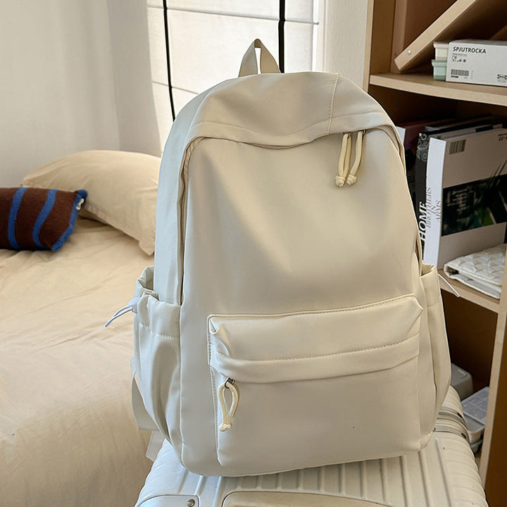 Multifunctional fashion backpack for school, work, travel. Durable unisex student bag, available in various colors.