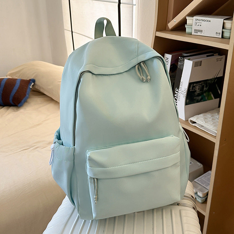 Stylish student backpack for daily commute. Unisex trendy school bag with ample space for books & essentials.