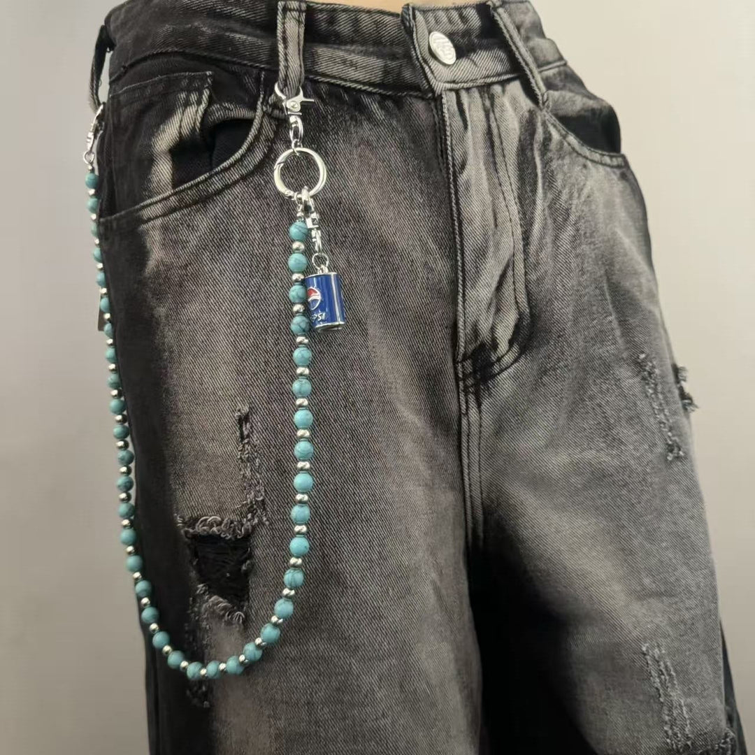 Trendy women's cropped t-shirt with chic chain pendant, perfect for summer casual wear.