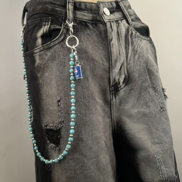 Trendy women's cropped t-shirt with chic chain pendant, perfect for summer casual wear.