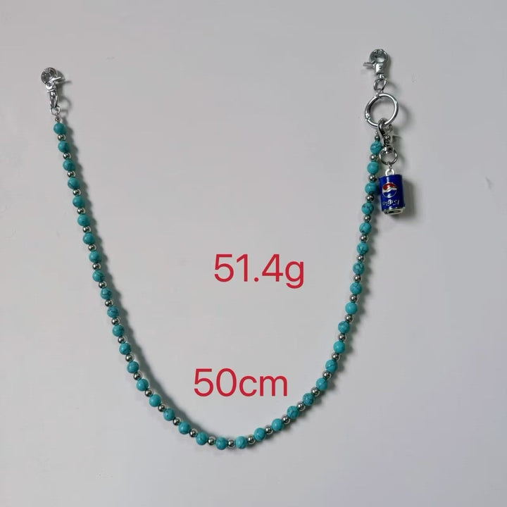 Women's trendy cropped t-shirt for casual wear. Features a chic chain pendant and comfortable short sleeves.