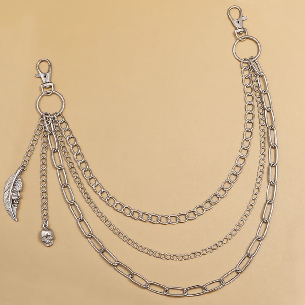 Fashionable gold chain waist belt for women, featuring unique charms and an adjustable design.
