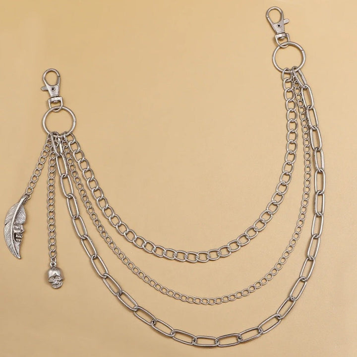 Fashionable gold chain waist belt for women, featuring unique charms and an adjustable design.