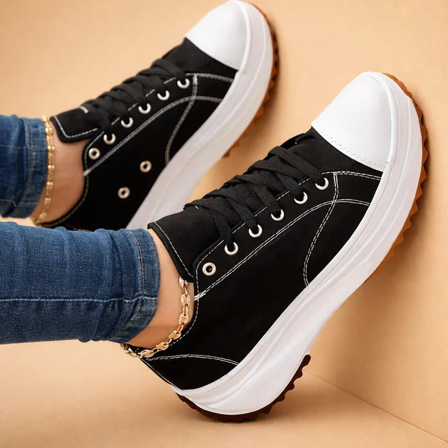 Trendy women's high-top sneakers with chunky sole, perfect for everyday comfort and casual style.