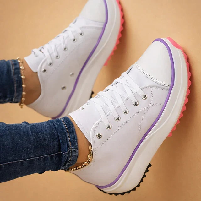 Stylish women's high-top sneakers, a fashion-forward design for versatile all-season wear.