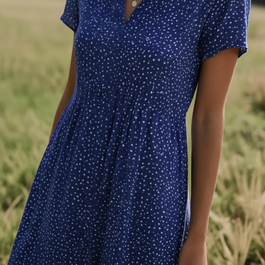 Flattering V-neck Tansy Midi Dress, a versatile and comfortable women's everyday dress.