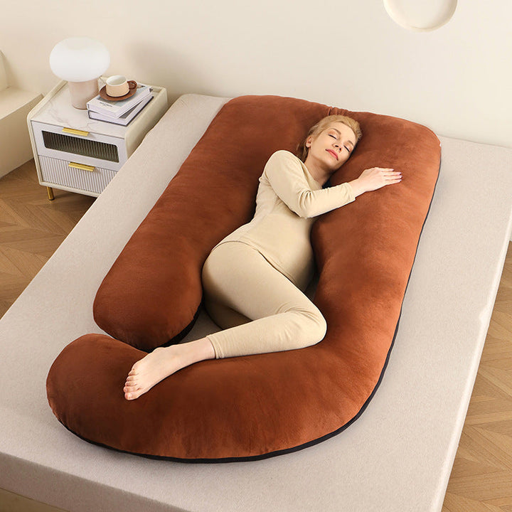 Ergonomic pain relief full body pillow with soft, washable cover.