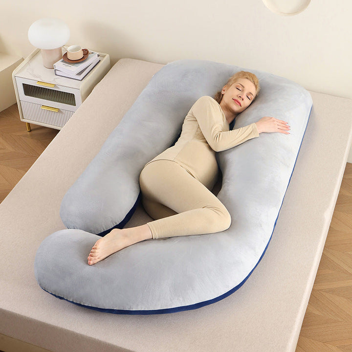 Pregnancy and back support full body pillow, U-shaped, for pain relief.