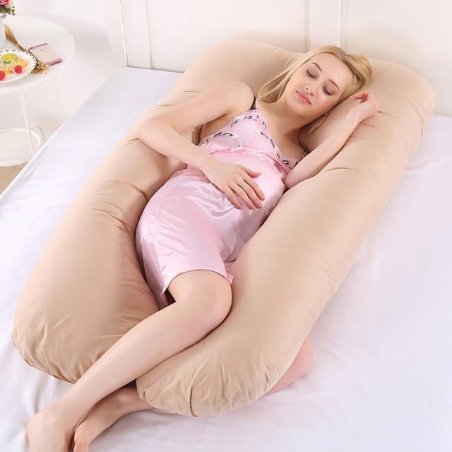 Women's U-shaped full body pregnancy pillow for ultimate comfort and back, hip, & belly support.