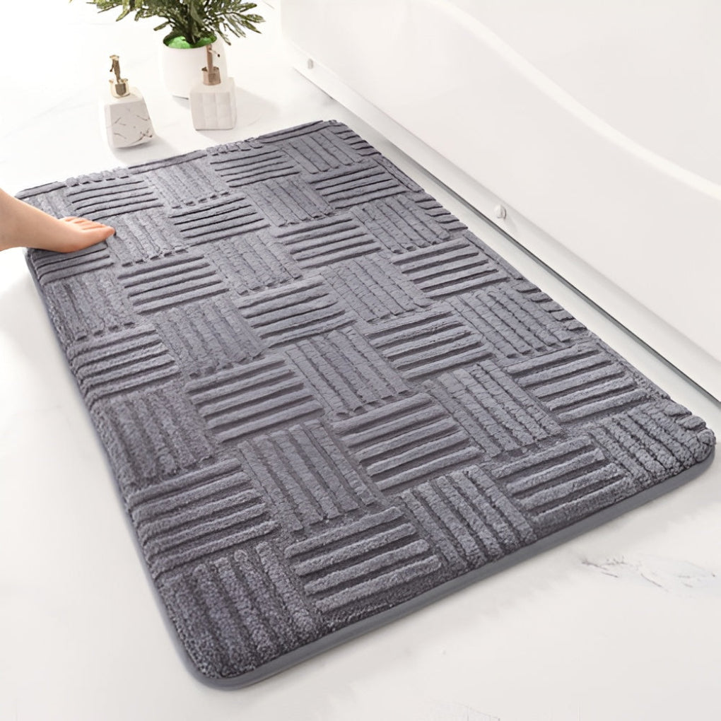 Ultra-absorbent shaggy cotton bathroom rug in a neutral color, perfect for a soft, quick-dry bath mat.