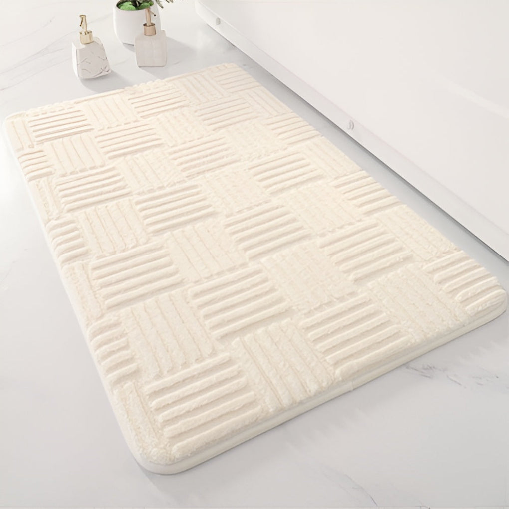 Soft, washable, non-slip shaggy bath mat. This absorbent cotton floor mat adds comfort and safety to your bathroom.