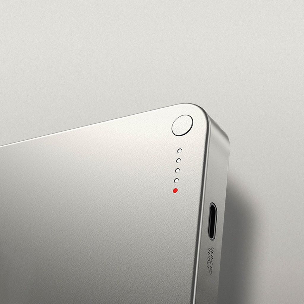 Ultra-slim power bank with magnetic wireless charging for on-the-go.