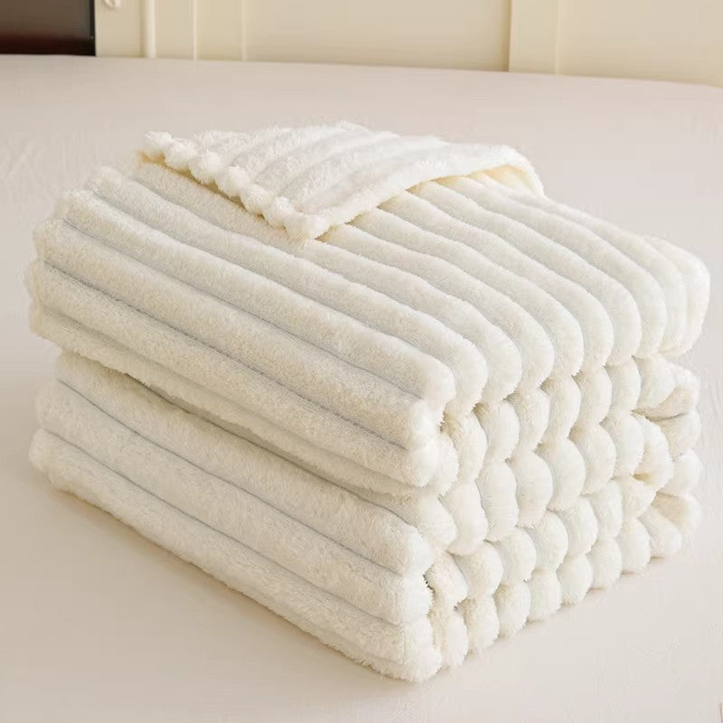 Ultra-soft 3D textured cuddle blanket for women, plush fabric, perfect for cozy comfort.