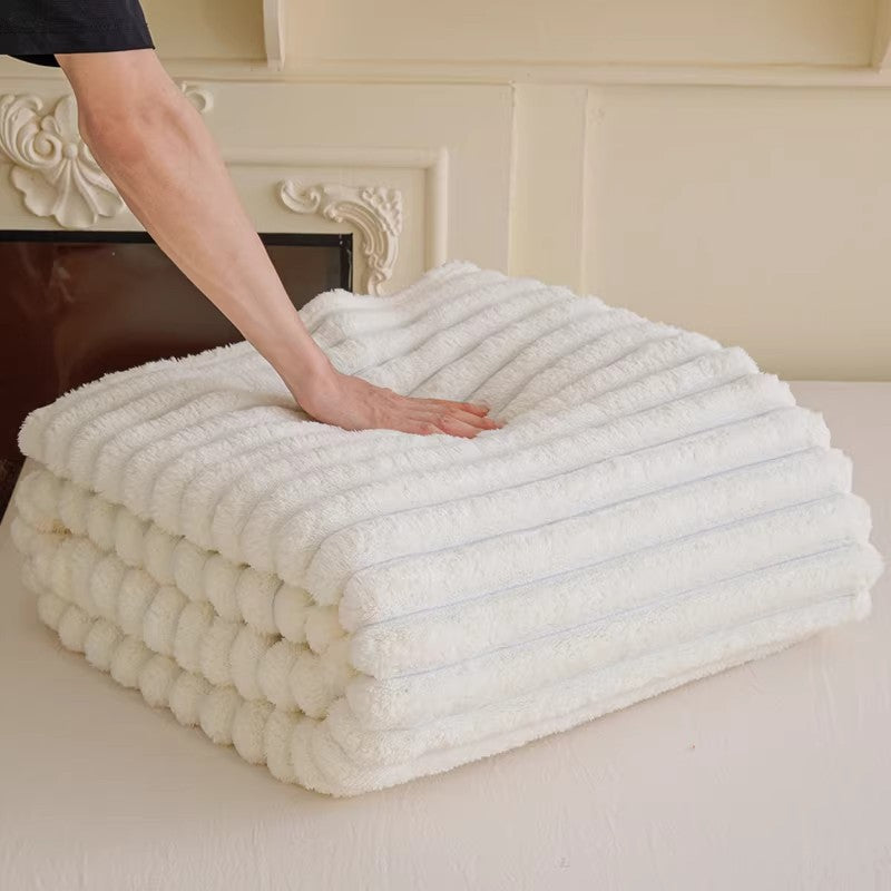 Plush, ultra-soft women's cuddle blanket with unique 3D texture, a warm bed blanket.