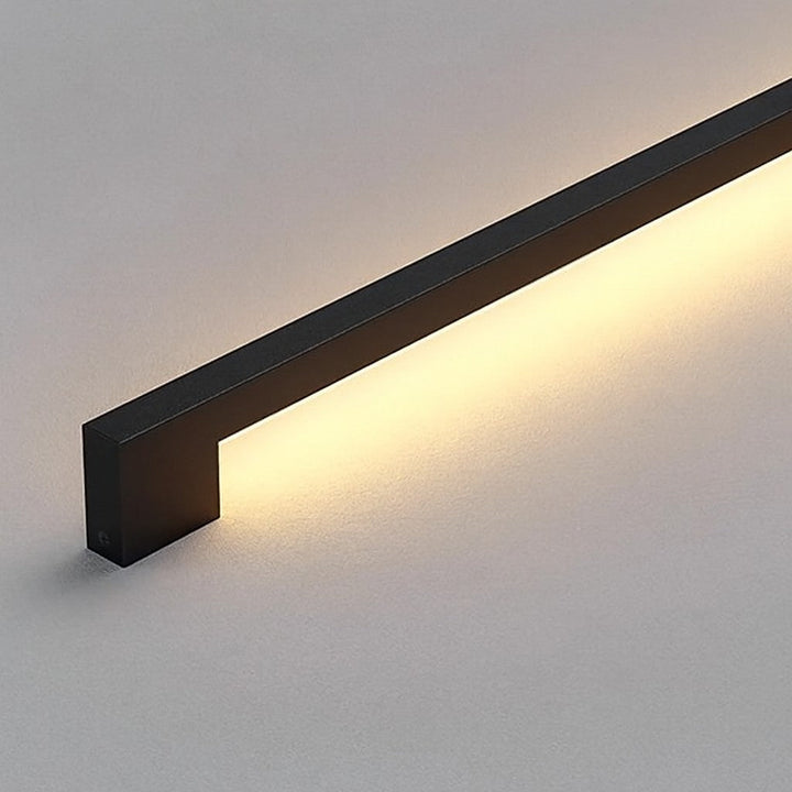 Dimmable LED wall sconce providing modern indoor lighting. Ultra-thin, minimalist design for versatile ambiance.