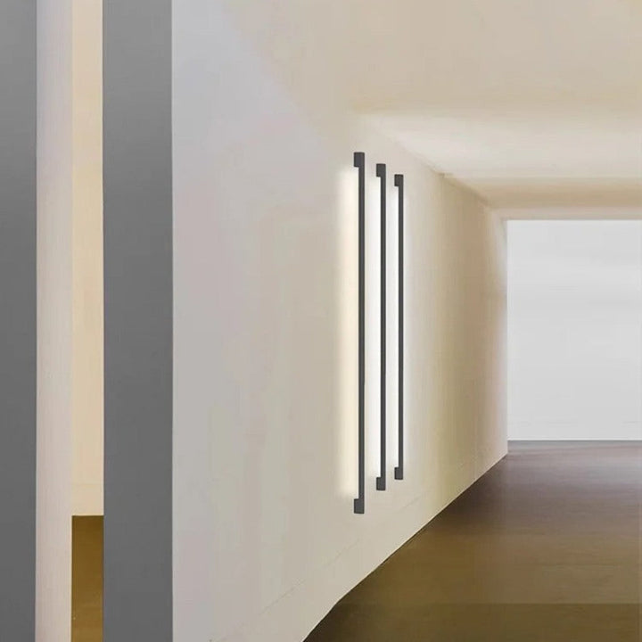 Contemporary LED wall sconce. Ultra-thin dimmable lighting, perfect for modern indoor home accents. Energy-efficient.