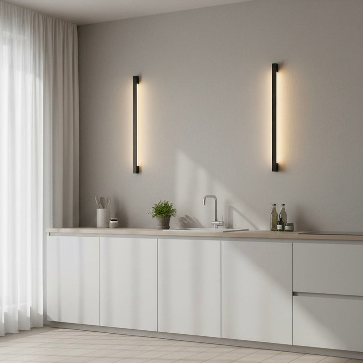 Sleek, ultra-thin LED wall sconce. Dimmable modern indoor lighting, perfect for contemporary home accents.