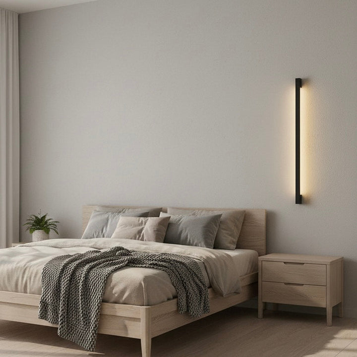 Dimmable ultra-thin LED wall sconce. Modern linear indoor lighting, energy-efficient and minimalist in design.