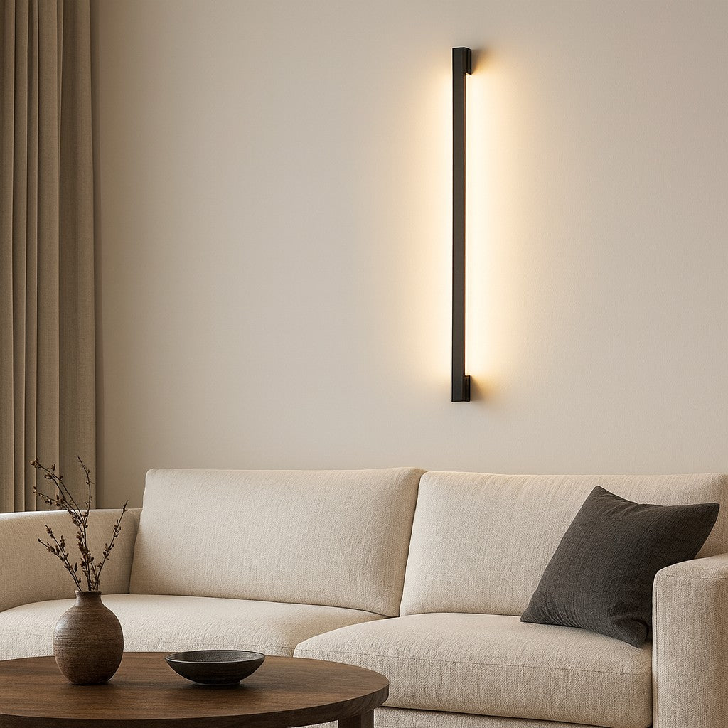 Contemporary linear LED wall sconce. Dimmable indoor lighting for modern homes; energy-efficient and sleek.