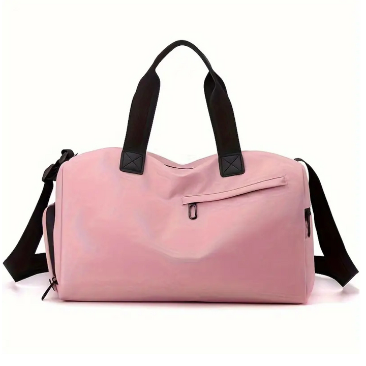 Person carrying the compact 20L waterproof gym bag, showing its versatile size and unisex design.