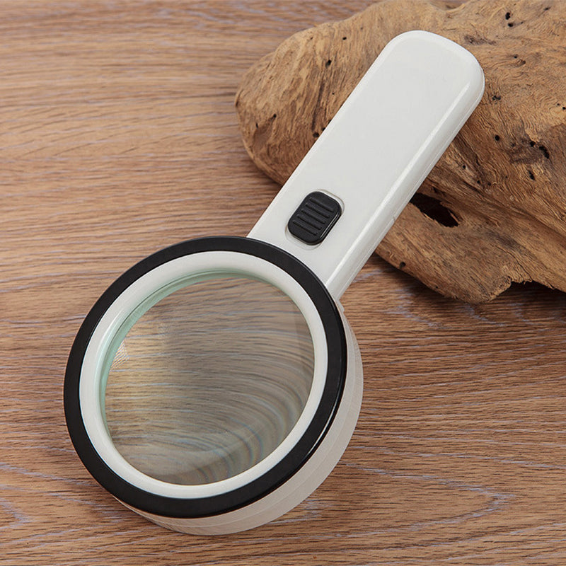 Durable 30x handheld LED magnifying lens for detailed inspection and improved reading.