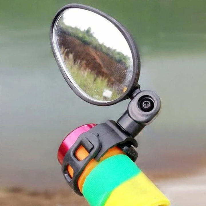 Compact cycling accessory: 360-degree rotating rearview mirror, easily attaches to handlebars for improved bike safety.