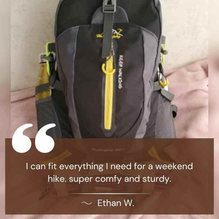 Hiker wearing a 40L waterproof backpack on a mountain trail, ideal for outdoor adventures.