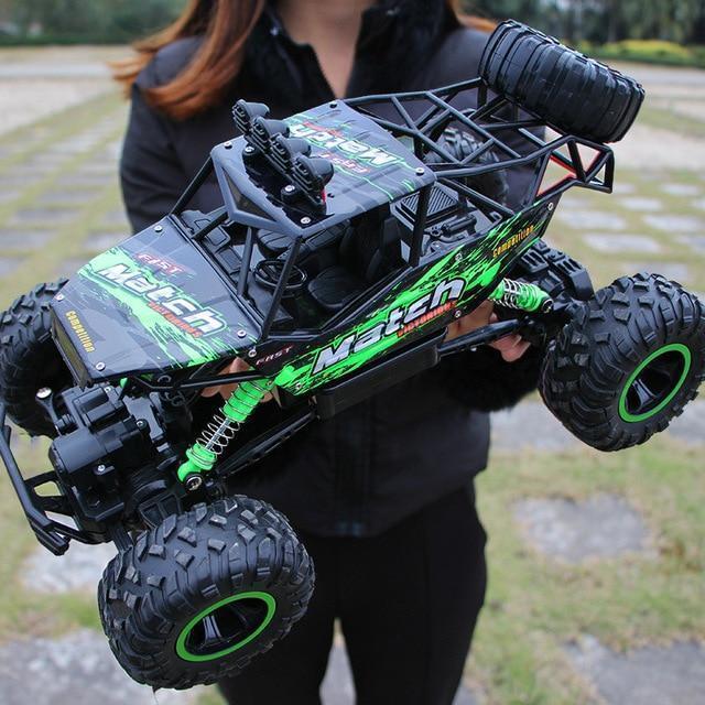 Dynamic 4x4 RC Monster Truck in action, conquering rough terrain. Rechargeable remote control toy for thrilling outdoor fun.