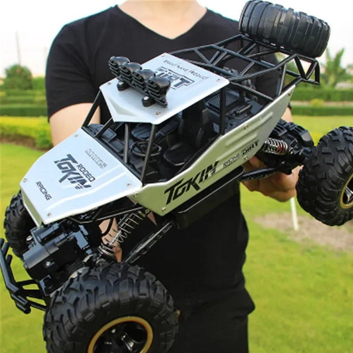 Close-up of a high-speed 4x4 RC Monster Truck. Durable, all-terrain electric remote control toy for outdoor adventure.