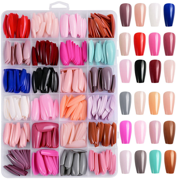 Unisex 576-piece gel nail tips kit with various shapes for professional manicures & DIY nail extensions.